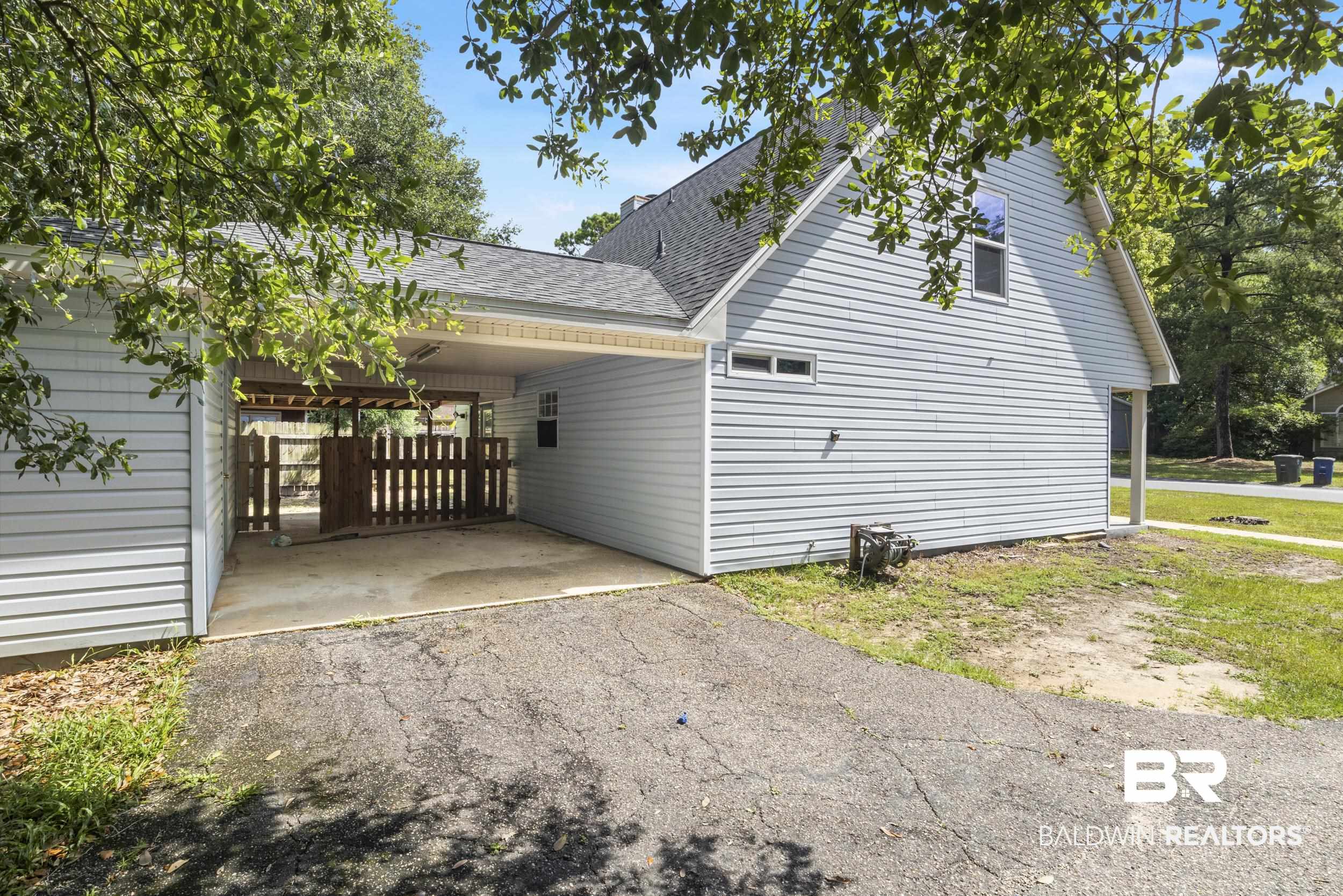 150 Montclair Loop Daphne, AL 36526 - Photo 8 of 29 View of side of home with a carport