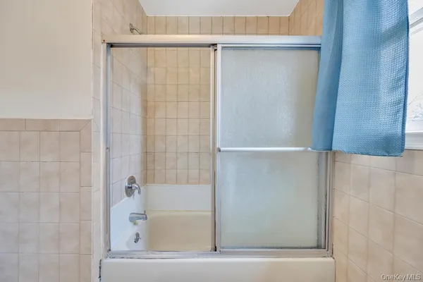 a bathroom with a bathtub