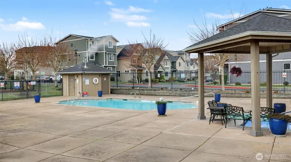 a front view of a house with yard