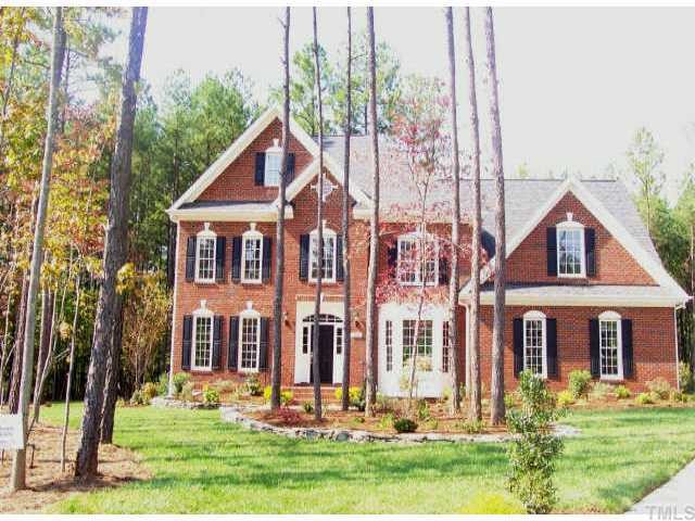 7209 Small Ridge Circle Raleigh, NC 27614 - Photo 1 of 1 front view of house with a yard