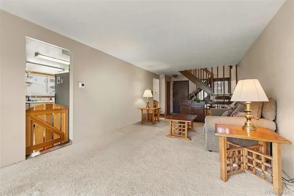 a bedroom with furniture and a chandelier