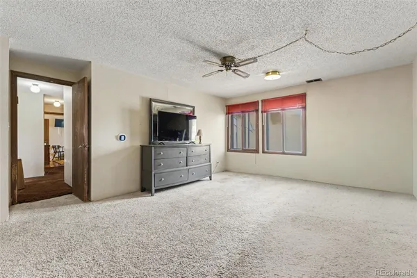 a view of a livingroom with a flat screen tv