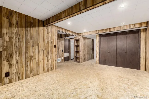 a view of a back yard with wooden floor