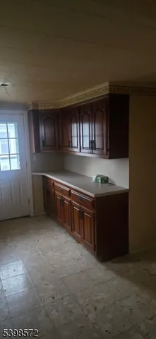 a kitchen with stainless steel appliances granite countertop a stove and a sink