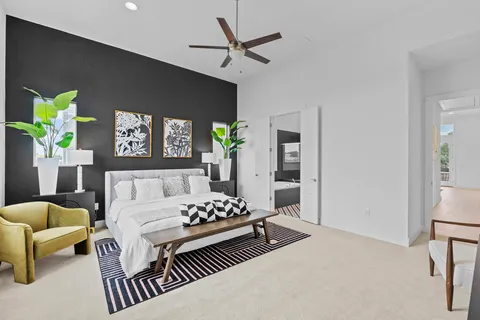 a bedroom with furniture and a couch