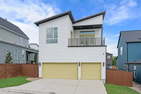 a view of a house with a garage