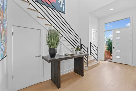 a view of staircase with white walls and stairs