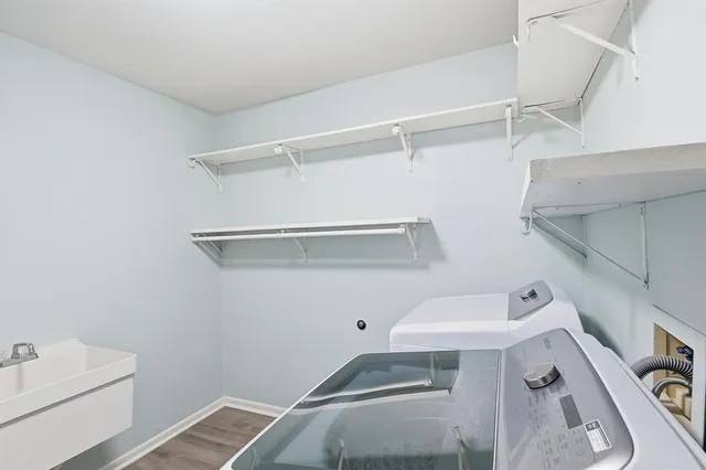 a utility room with dryer and washer