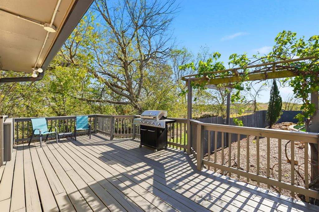 3873 Lois Road East Sanger, TX 76266 - Photo 32 of 40 a view of a chairs on a deck