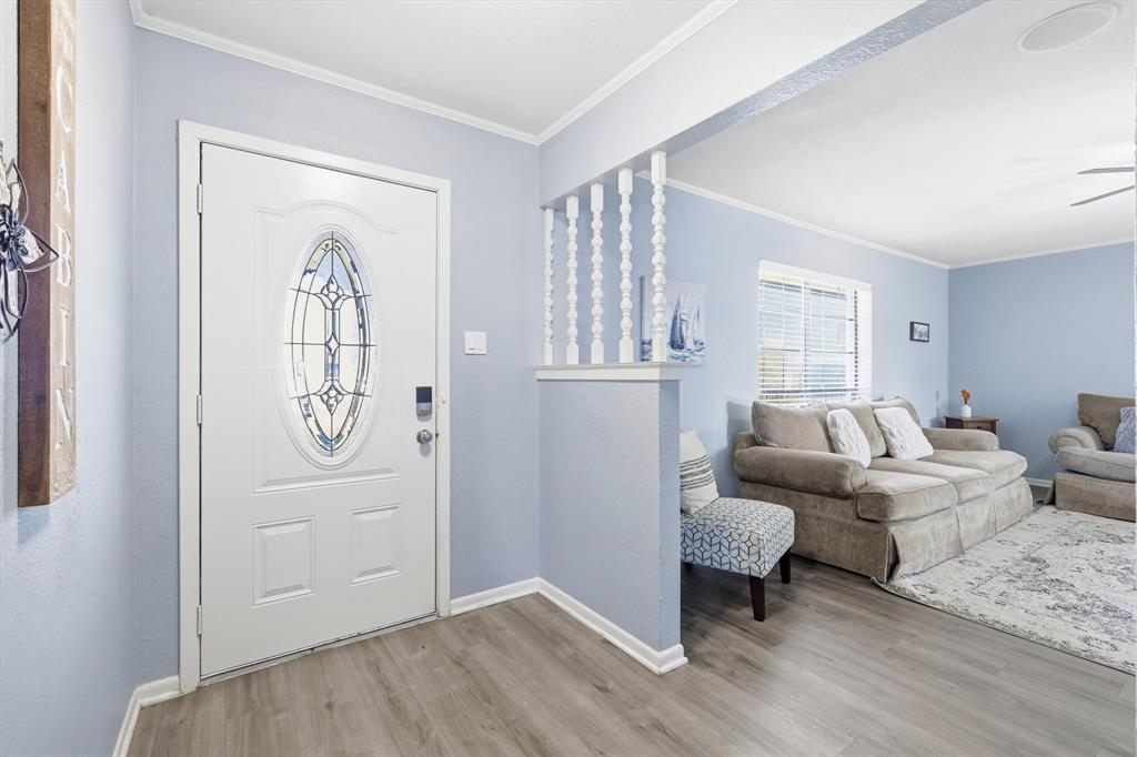 3873 Lois Road East Sanger, TX 76266 - Photo 9 of 40 a living room with furniture and a window