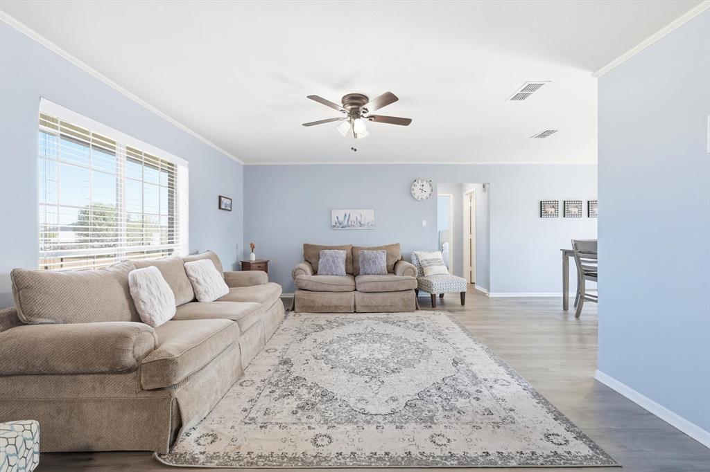 3873 Lois Road East Sanger, TX 76266 - Photo 10 of 40 a living room with furniture and a large window