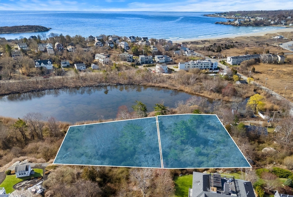 6-8 Joppa Way Gloucester, MA 01930 - Photo 1 of 11 an aerial view of residential houses with outdoor space