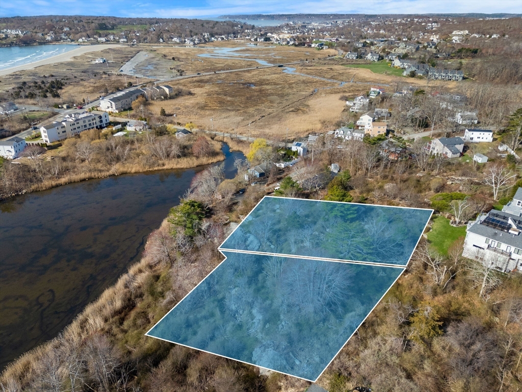 6-8 Joppa Way Gloucester, MA 01930 - Photo 2 of 11 an aerial view of residential houses with outdoor space
