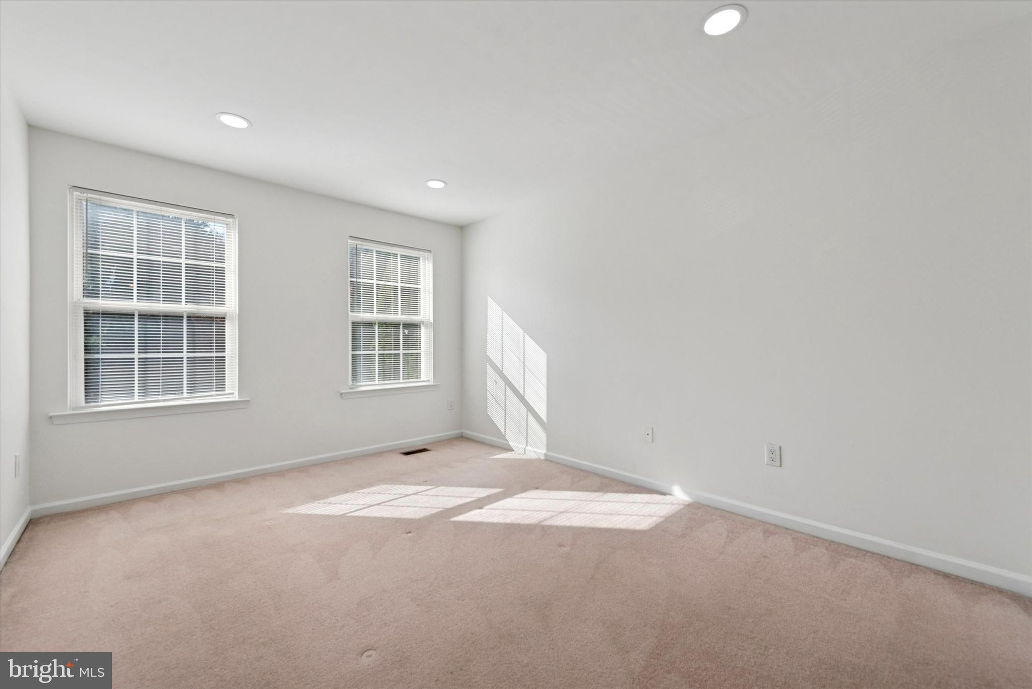 69 Granite Lane Chester Springs, PA 19425 - Photo 13 of 25 a view of empty room with windows