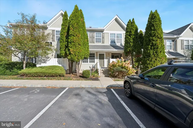 a view of a street with cars