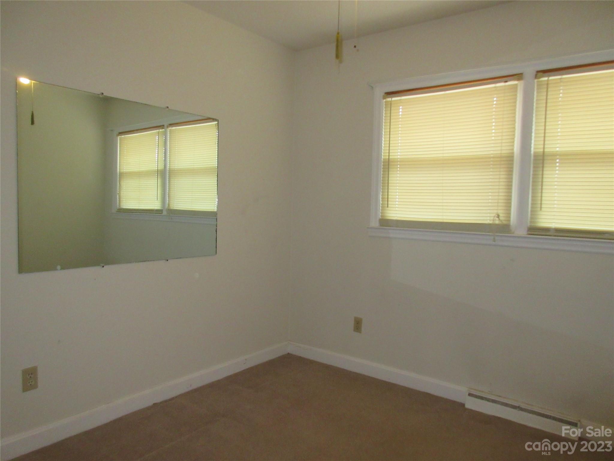 145 Hodge Street Rutherfordton, NC 28139 - Photo 14 of 24 an empty room with a window