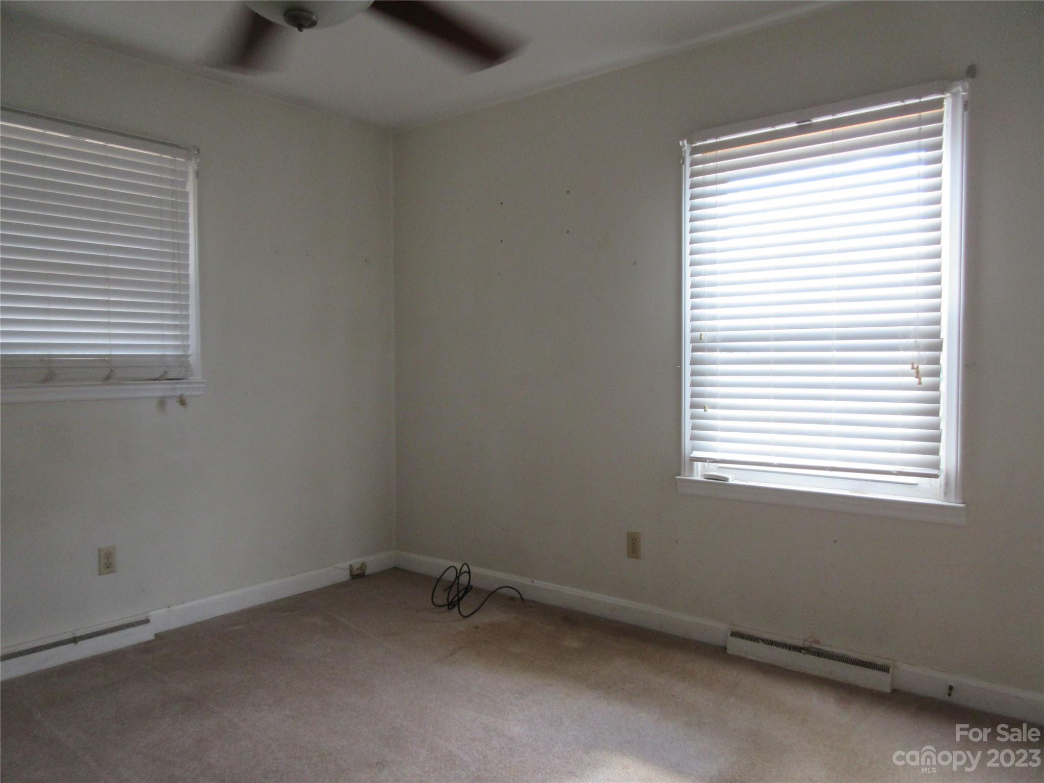 145 Hodge Street Rutherfordton, NC 28139 - Photo 16 of 24 an empty room with a window