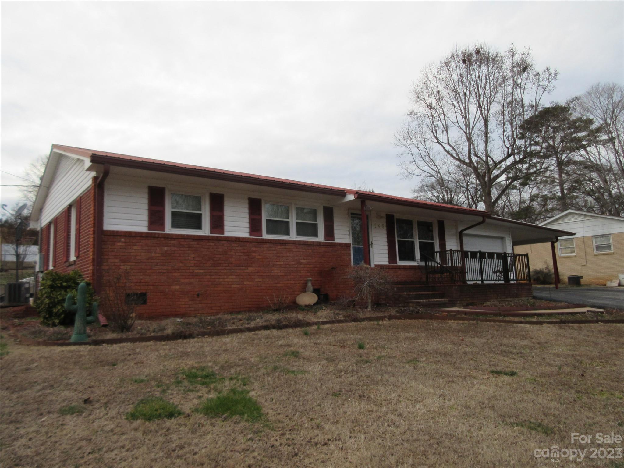 145 Hodge Street Rutherfordton, NC 28139 - Photo 2 of 24 a front view of a house with a yard
