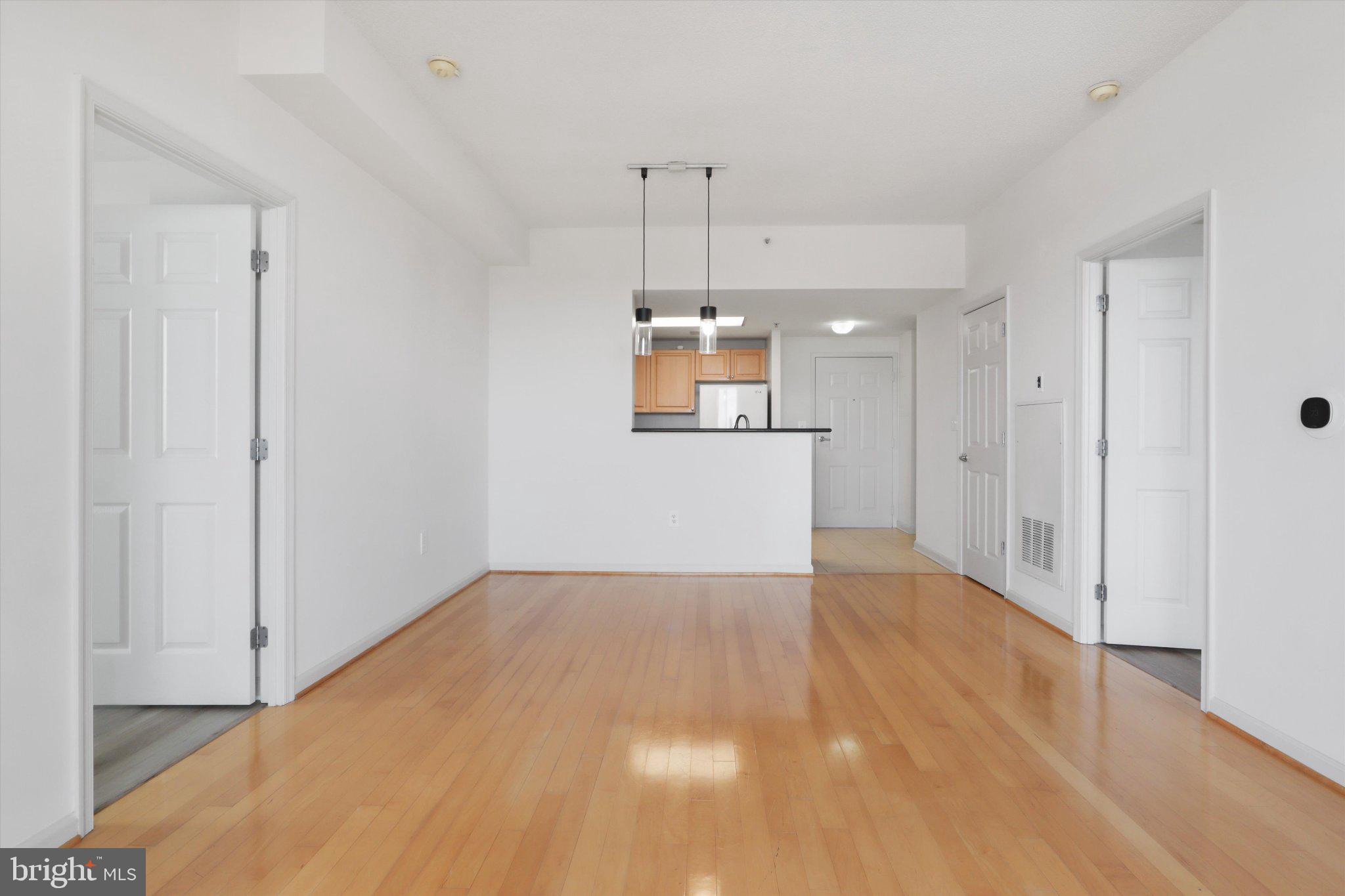 2726 Gallows Road, Unit 1506 Vienna, VA 22180 - Photo 7 of 35 Spacious, sunlit open layout.