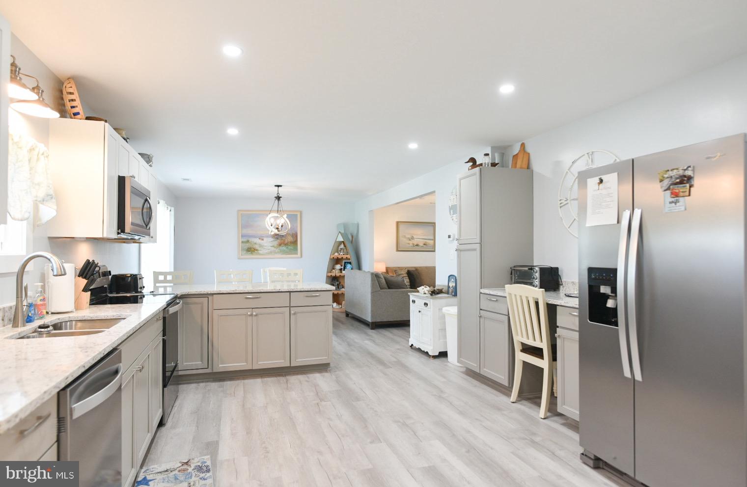 25830 Rumbley Road Westover, MD 21871 - Photo 20 of 59 a kitchen with a refrigerator and a sink