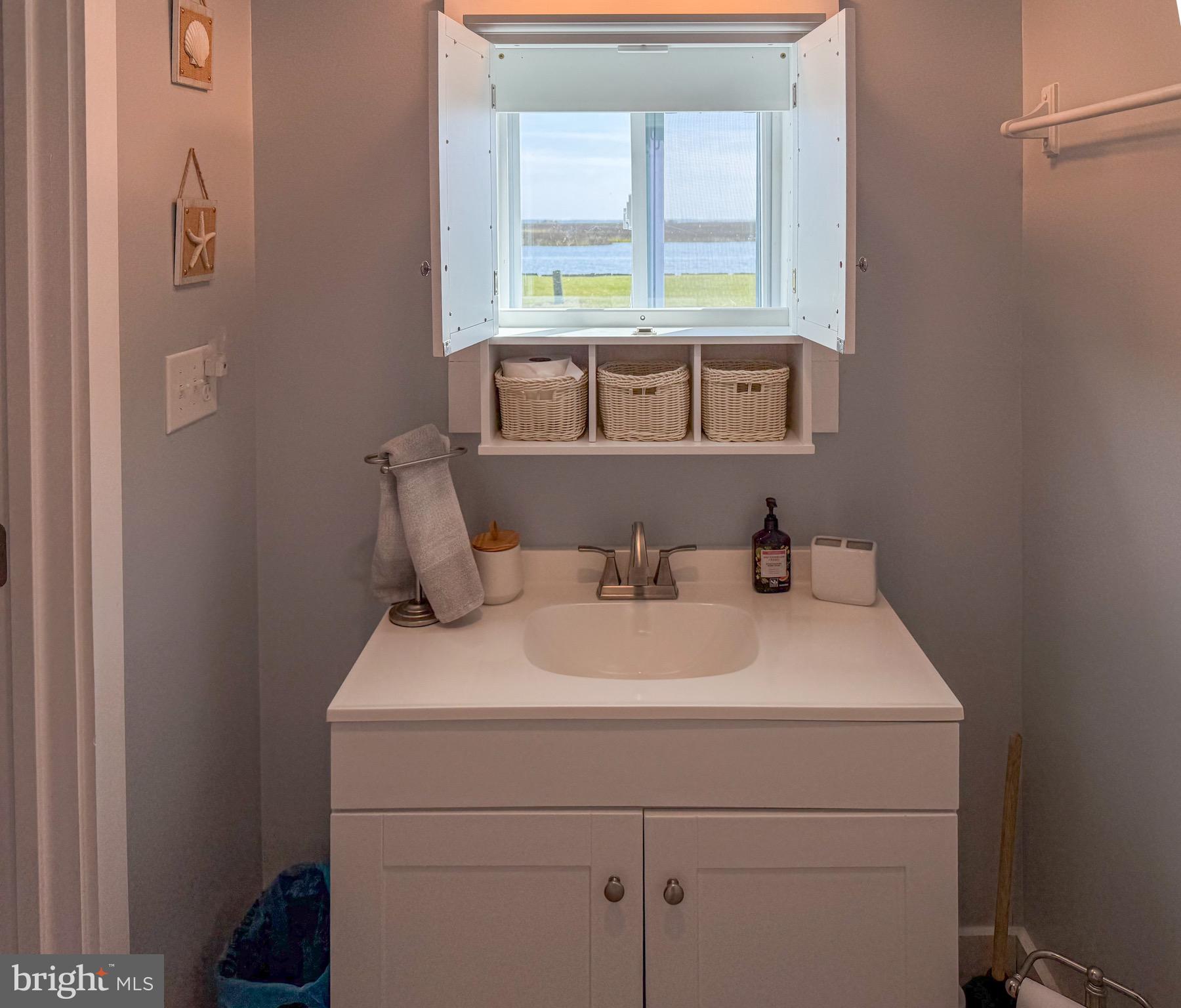 25830 Rumbley Road Westover, MD 21871 - Photo 29 of 59 a bathroom with a sink and a vanity