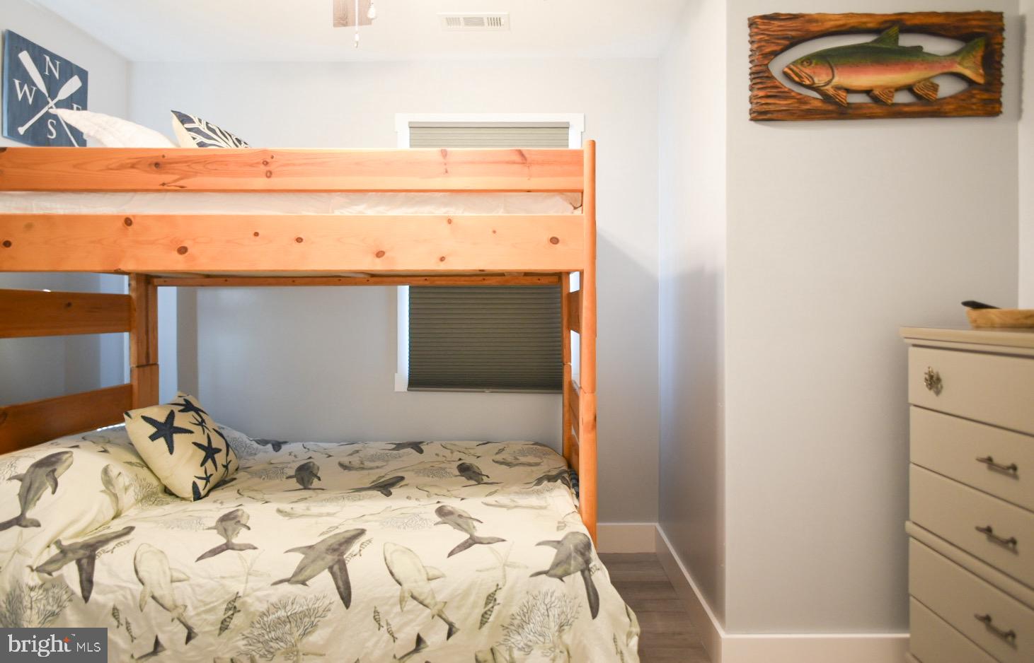 25830 Rumbley Road Westover, MD 21871 - Photo 32 of 59 a bedroom with a bed and a closet