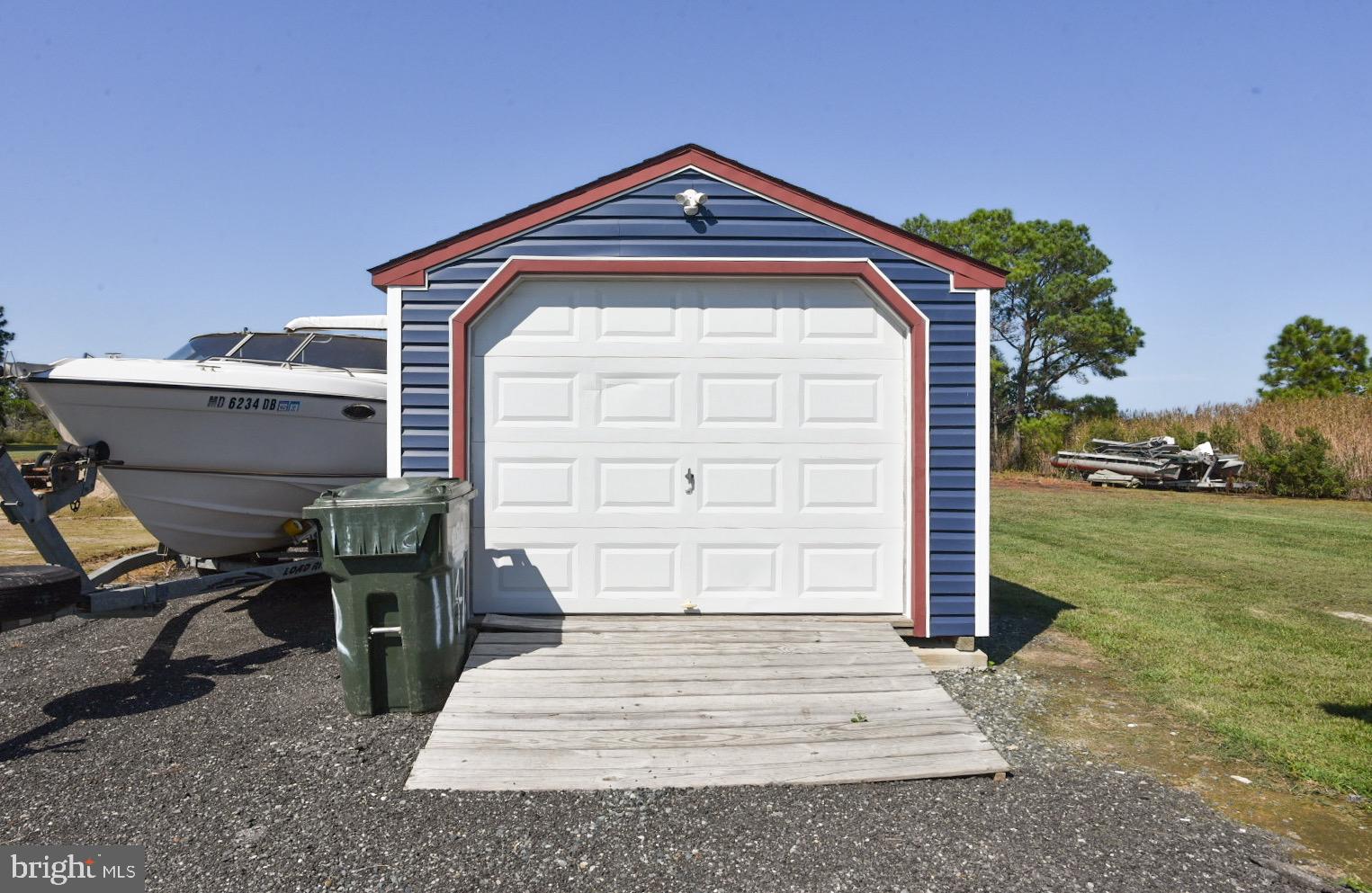 25830 Rumbley Road Westover, MD 21871 - Photo 10 of 59 a front view of a house with a yard