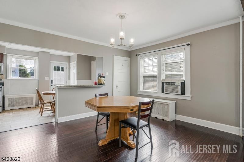 110 Parker Street Middlesex, NJ 08846 - Photo 10 of 25 a view of a a dining room with furniture window and wooden floor