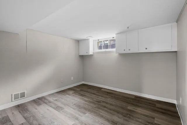 a view of kitchen with wooden floor