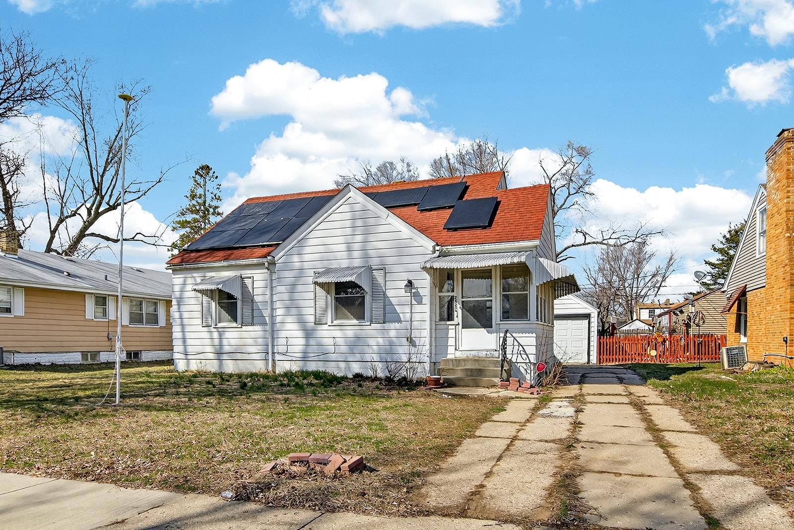 a view of a house with a yard