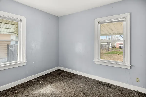 an empty room with closet