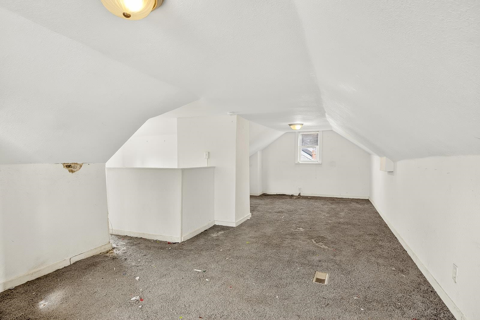 2823 Ridgeway Avenue Rockford, IL 61101 - Photo 28 of 28 an empty room with cabinet and windows