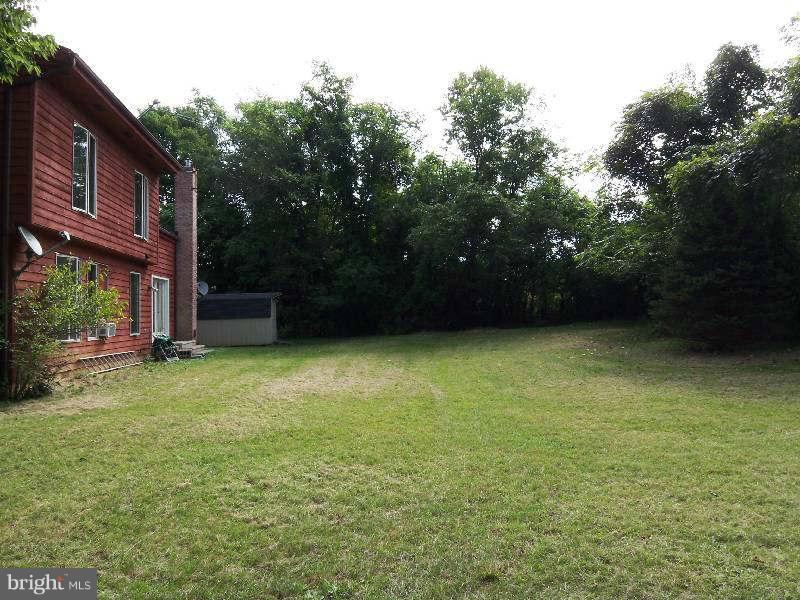 667 Morgan Grove Road Shepherdstown, WV 25443 - Photo 11 of 30 a view of a backyard of a house