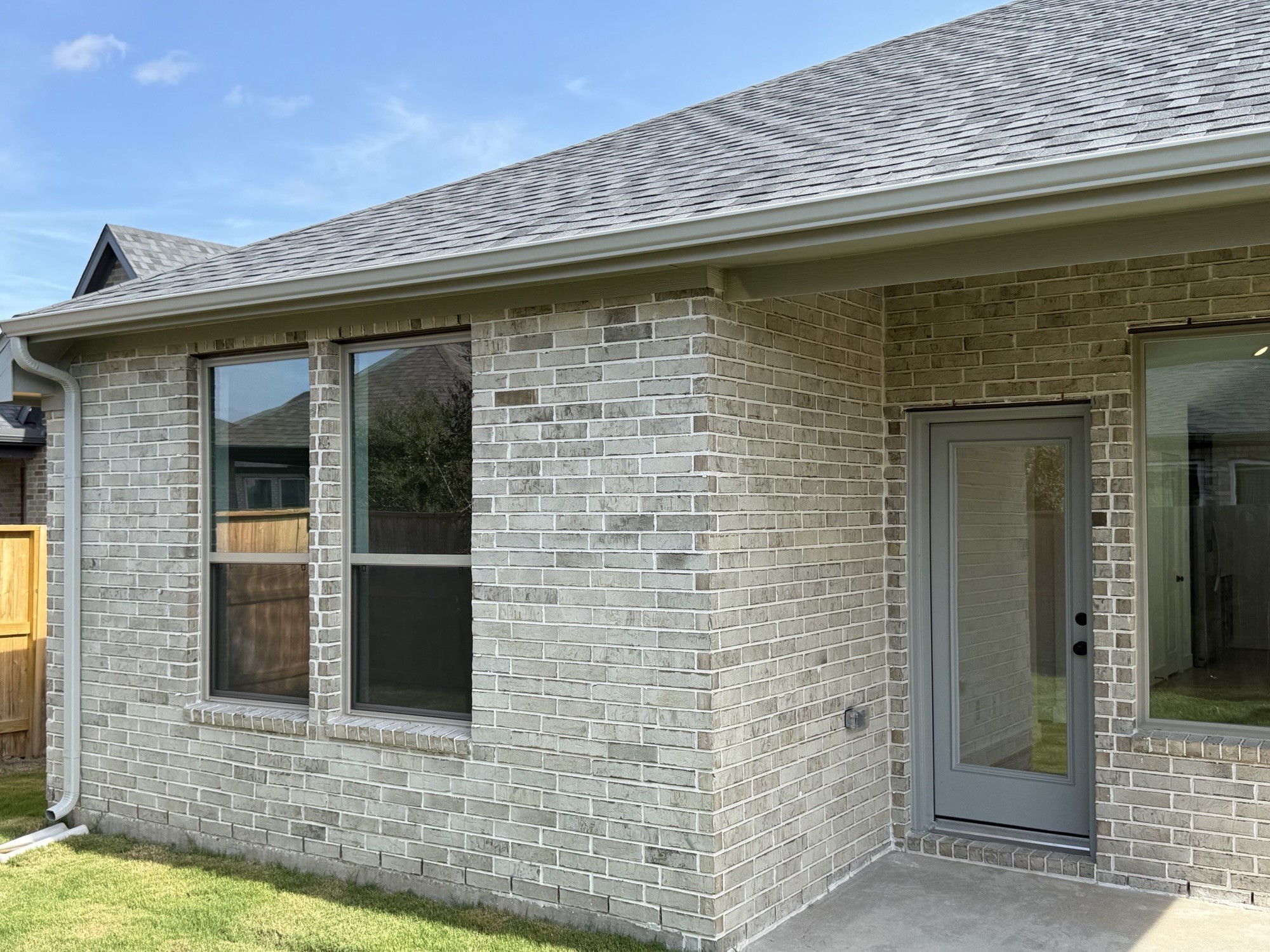5111 Getty Lane Manvel, TX 77578 - Photo 13 of 38 a front view of a house with glass windows