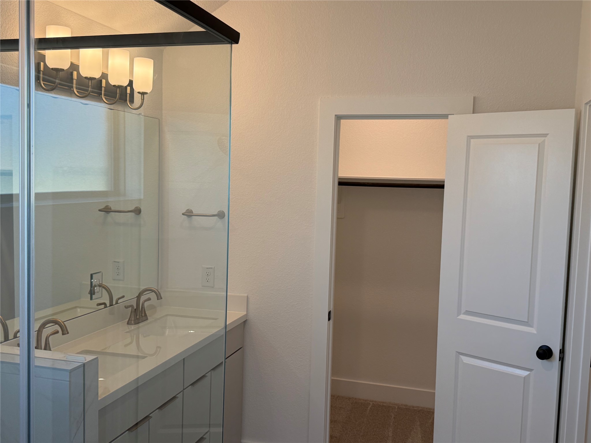 5111 Getty Lane Manvel, TX 77578 - Photo 7 of 38 a bathroom with a sink and mirror