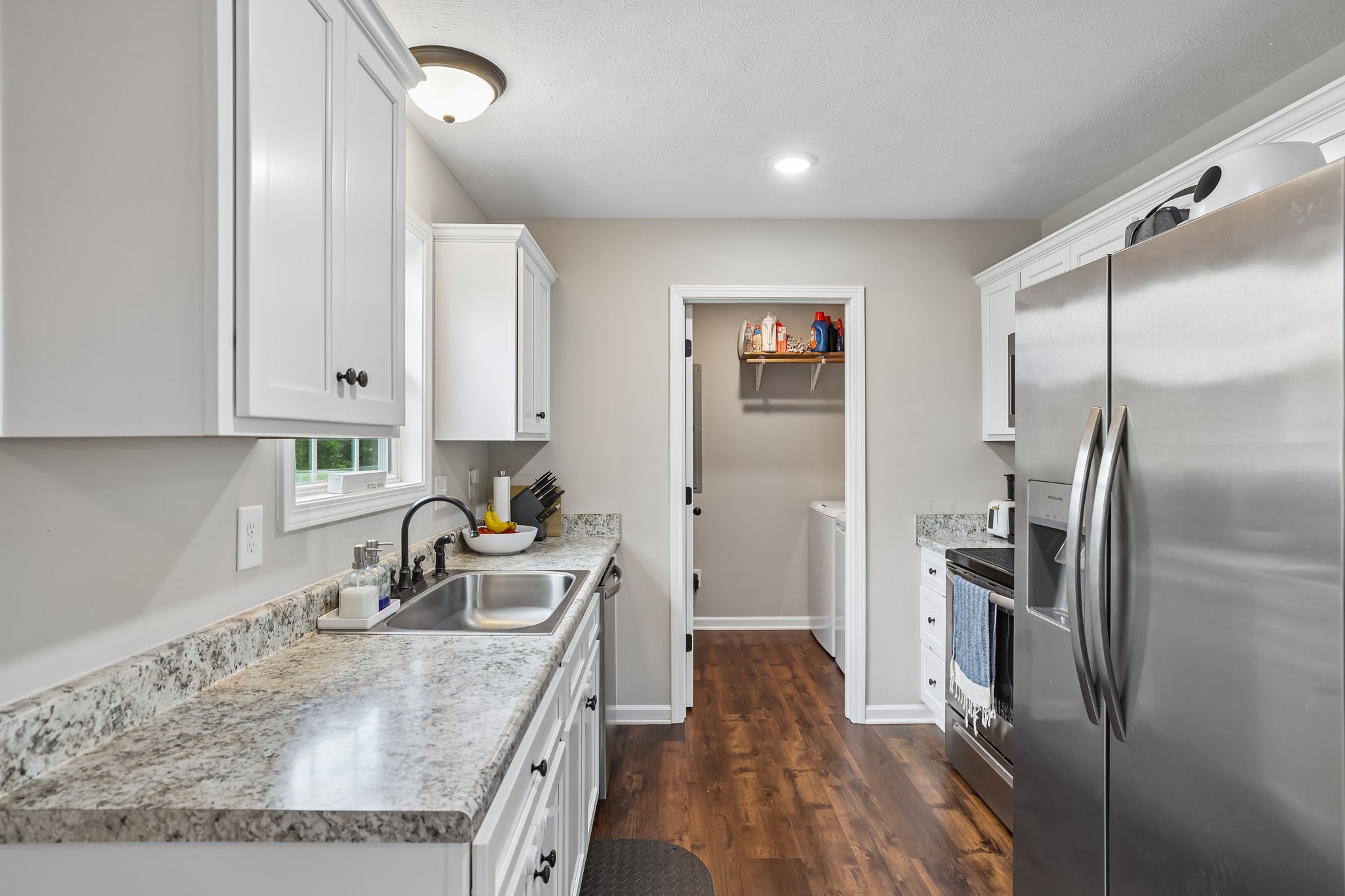 1715 Old Belfast Road Lewisburg, TN 37091 - Photo 19 of 42 a kitchen with a refrigerator and a sink
