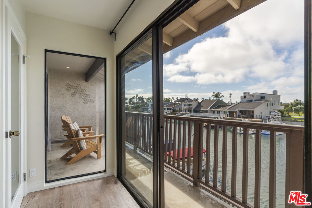 4555 Falkirk Bay, Unit BAY Oxnard, CA 93035 - Photo 22 of 46 a view of a balcony with furniture