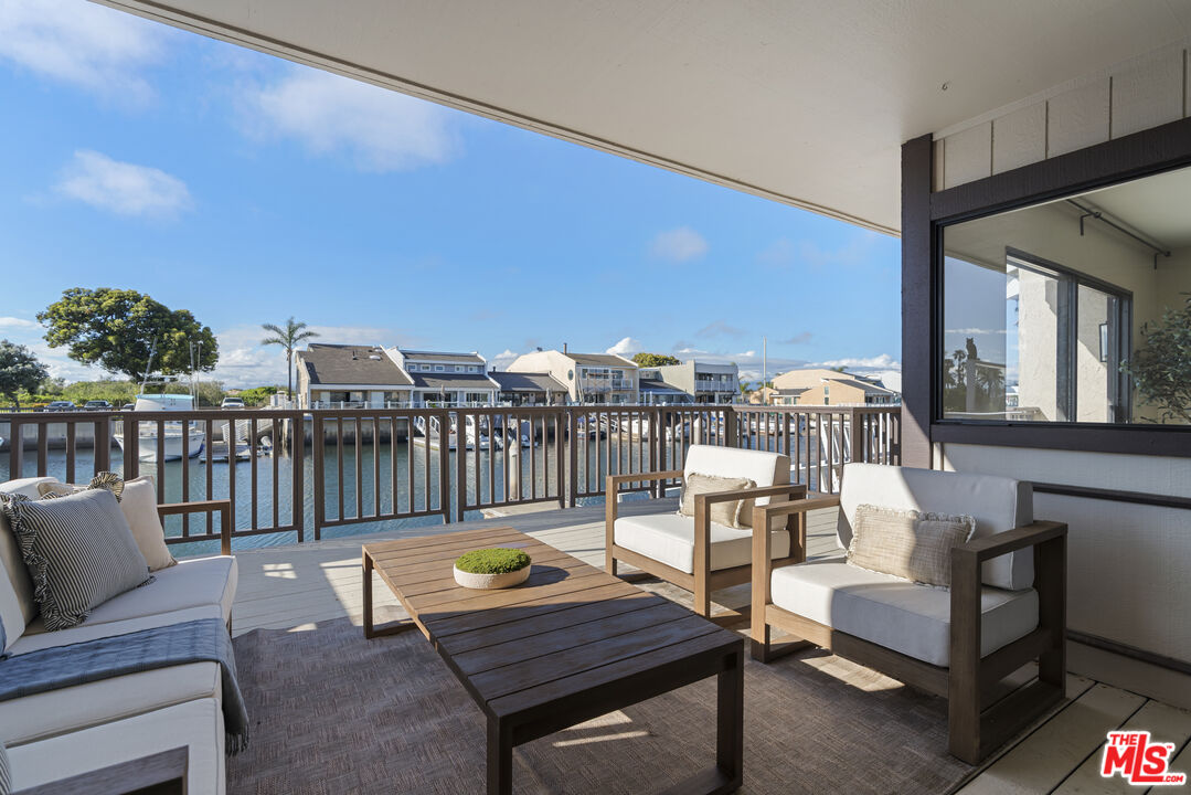 4555 Falkirk Bay, Unit BAY Oxnard, CA 93035 - Photo 5 of 46 a view of a balcony with furniture