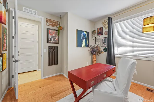 a view of a livingroom with furniture and window