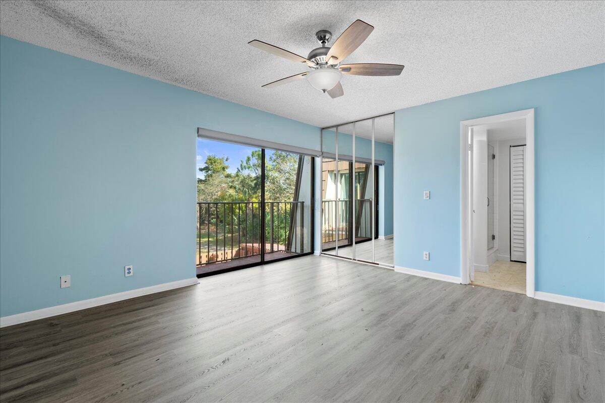 6038 Southeast Riverboat Drive, Unit 716 Stuart, FL 34997 - Photo 12 of 28 a view of an empty room with a window