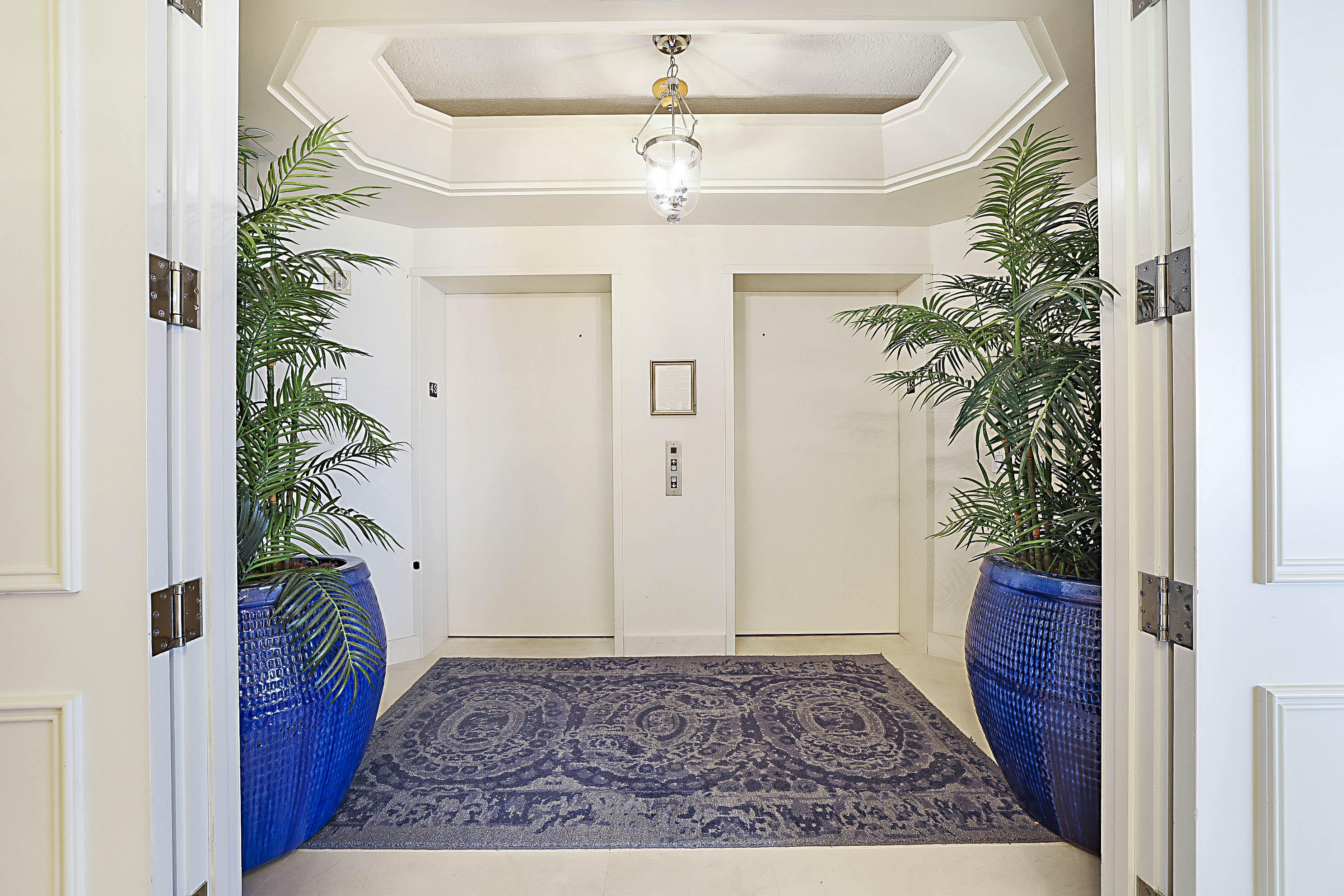 19950 South Beach Road, Unit 4 Tequesta, FL 33469 - Photo 25 of 56 a view of entryway with a potted plant