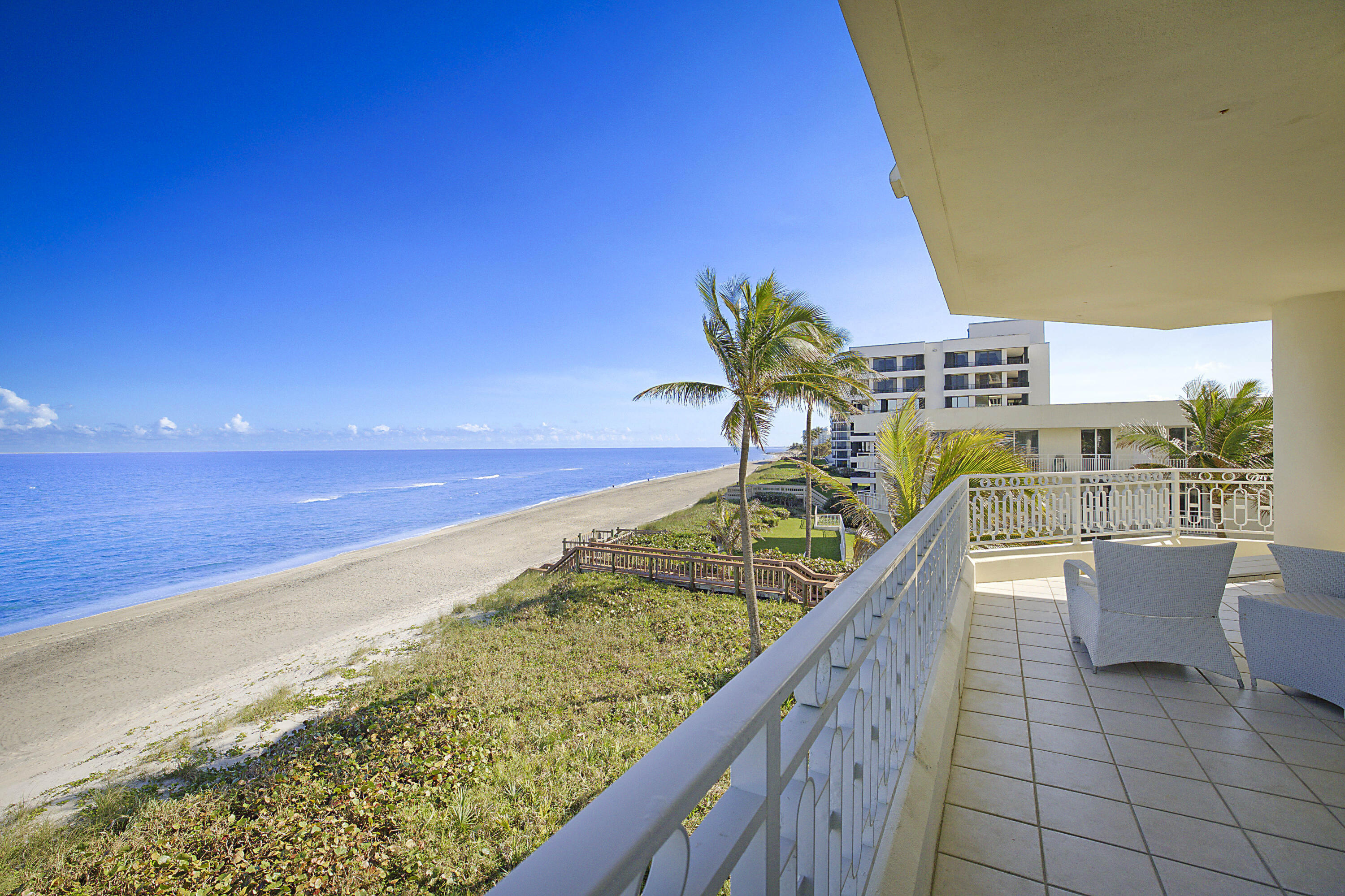 19950 South Beach Road, Unit 4 Tequesta, FL 33469 - Photo 33 of 56 a view of ocean from a balcony