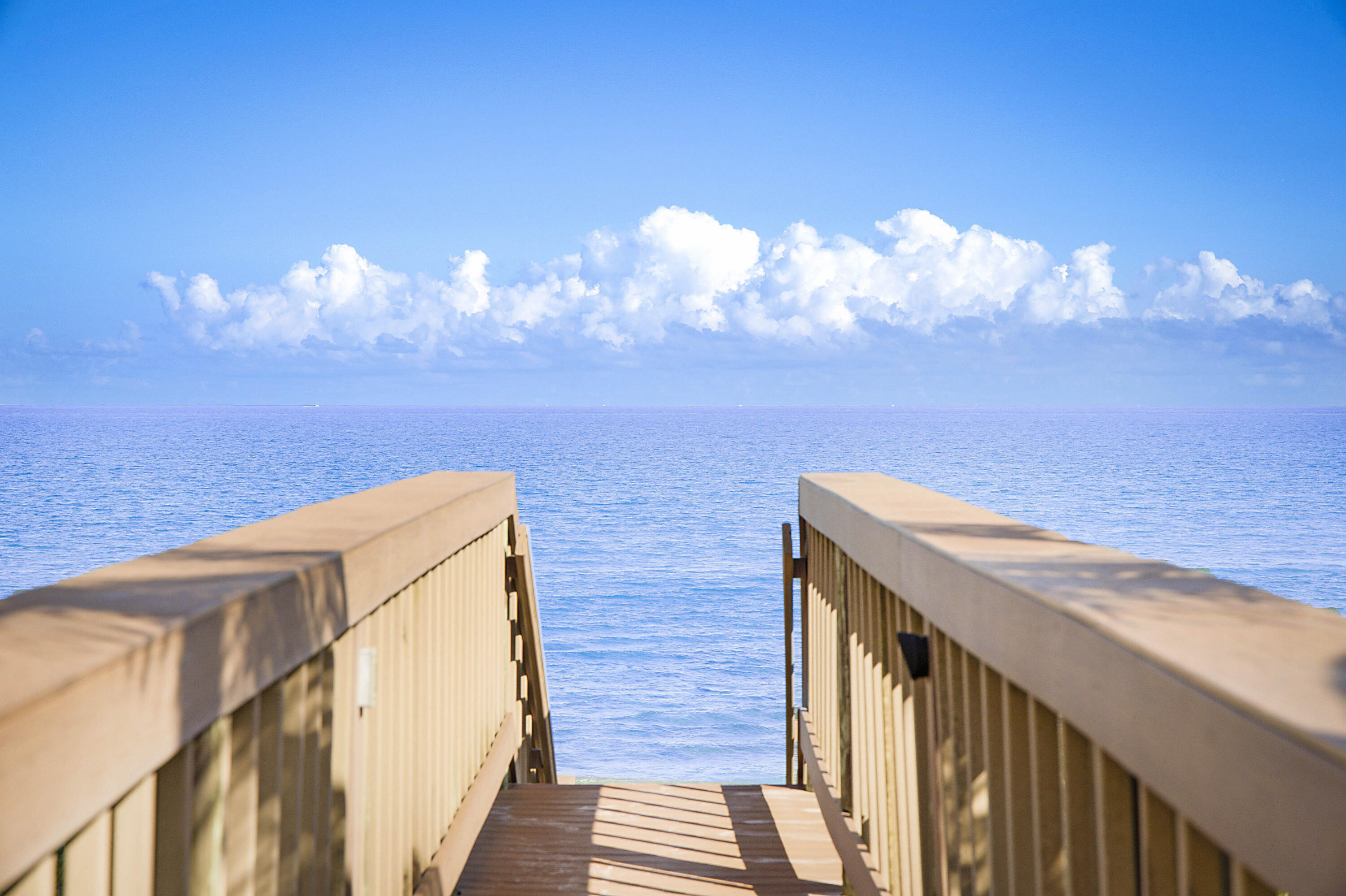 19950 South Beach Road, Unit 4 Tequesta, FL 33469 - Photo 42 of 56 a view of a balcony with an ocean