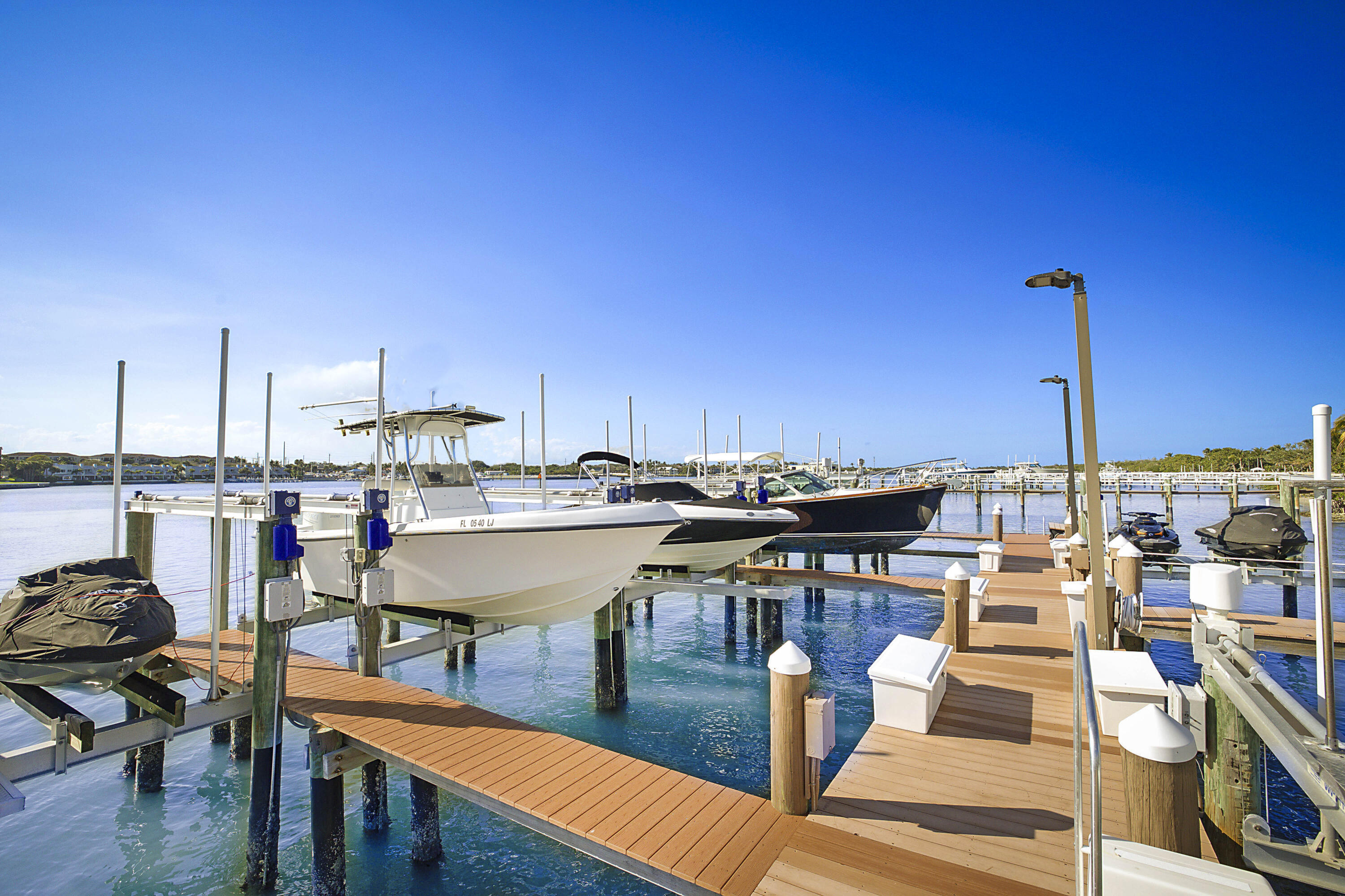 19950 South Beach Road, Unit 4 Tequesta, FL 33469 - Photo 48 of 56 a view of a terrace with seating area