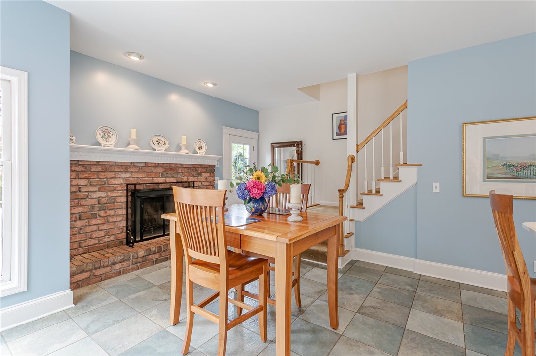 255 Totem Trail Irondequoit, NY 14617 - Photo 19 of 48 The eat-in area features an inviting brick wood bu