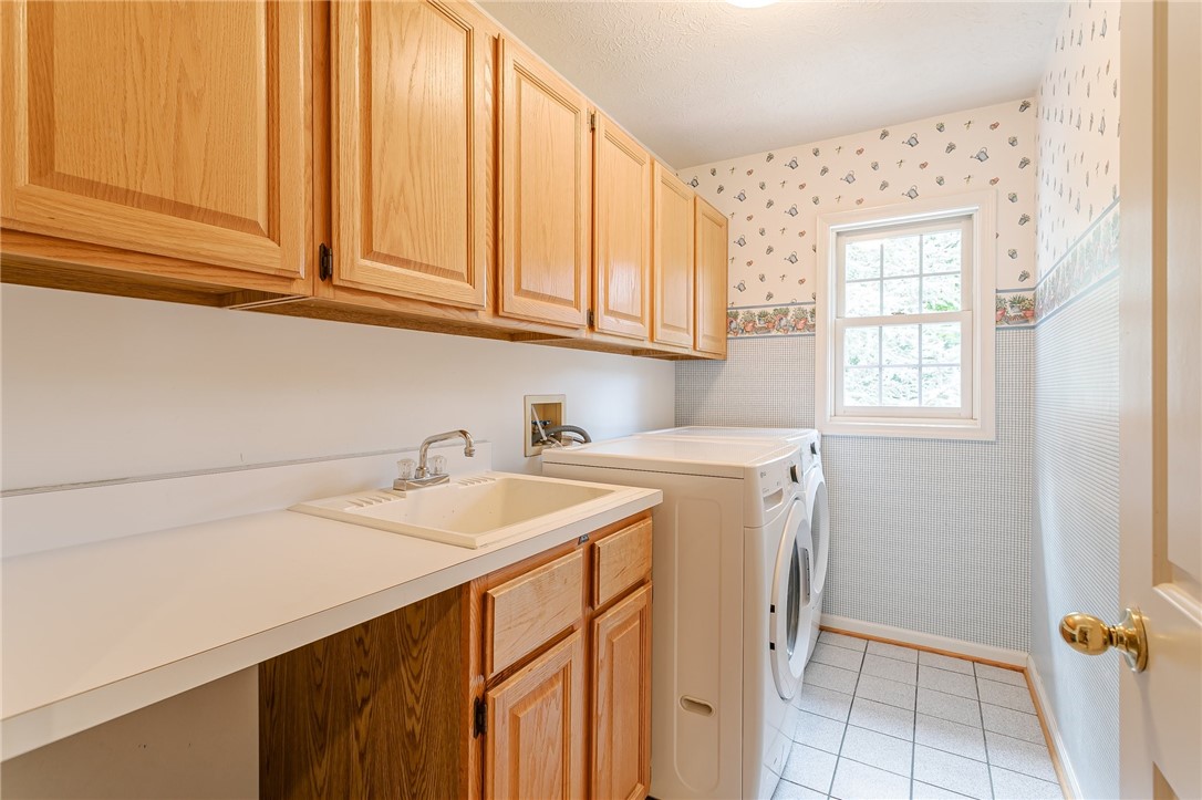 255 Totem Trail Irondequoit, NY 14617 - Photo 27 of 48 Second floor laundry area has great storage!
