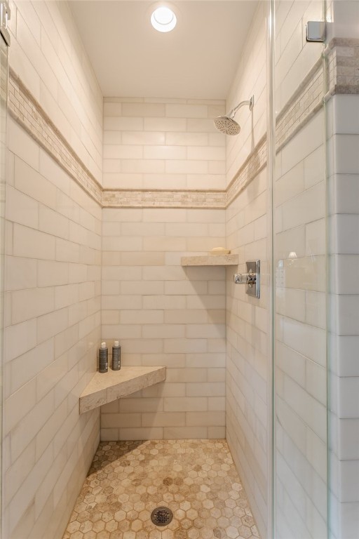 255 Totem Trail Irondequoit, NY 14617 - Photo 32 of 48 Honed marble walk-in shower with limestone tile fl