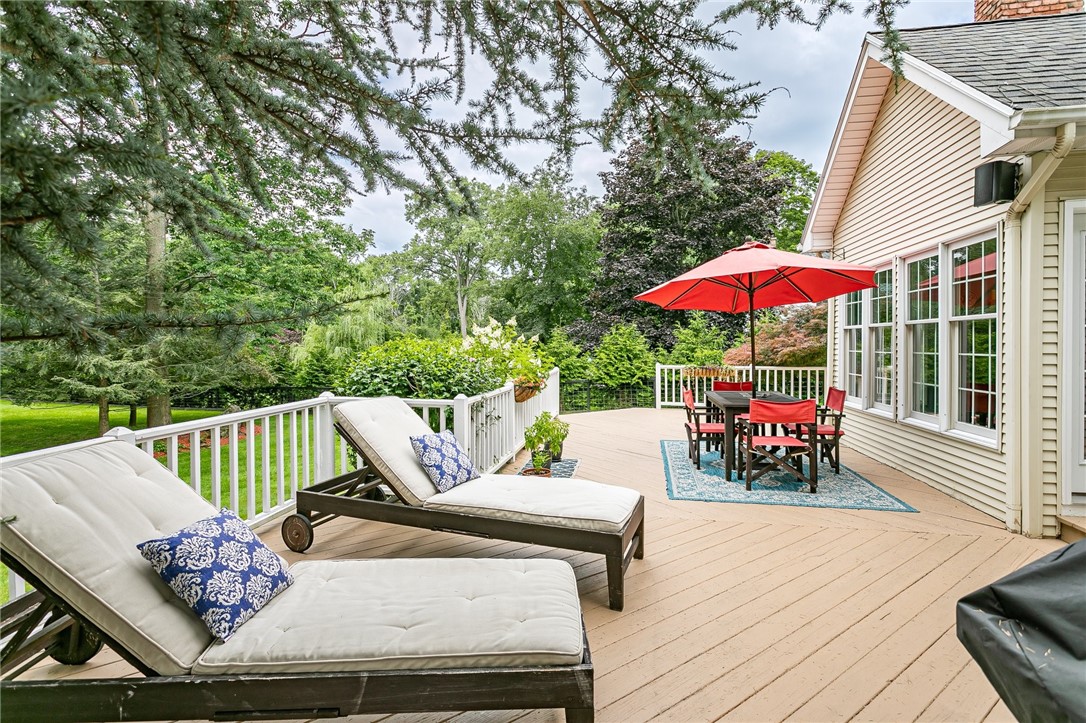 255 Totem Trail Irondequoit, NY 14617 - Photo 36 of 48 Expansive deck surrounded by stone raised garden b