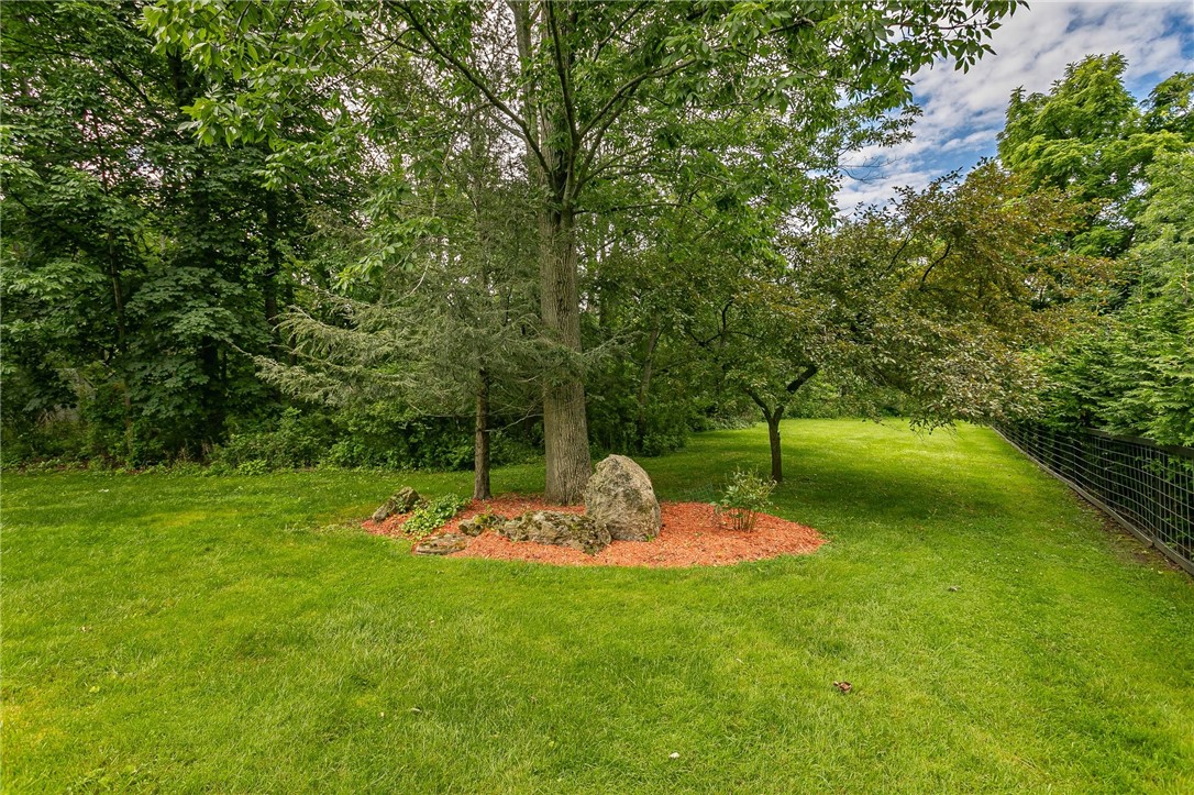 255 Totem Trail Irondequoit, NY 14617 - Photo 39 of 48 Beautifully landscaped yard with mature perennials