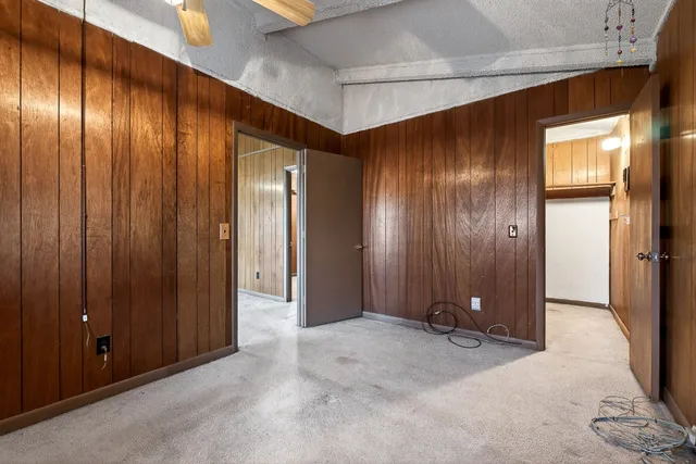 a view of a chairs and table in patio